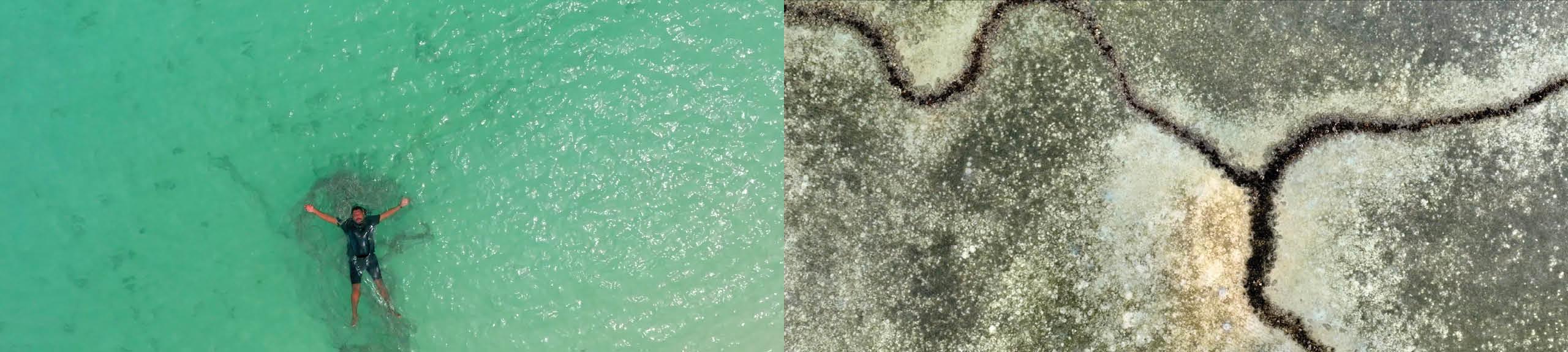 Man lying on back floating in clear aqua water next to a topographic shot of the reef in the Torres Strait